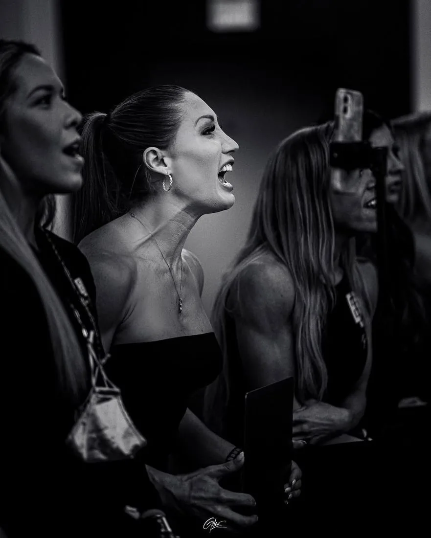 Boss Bodies coach and athlete backstage before a bikini show